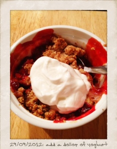 Strawberry crumble with a dollop of yoghurt
